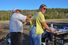 Dezi cutting the shirttail